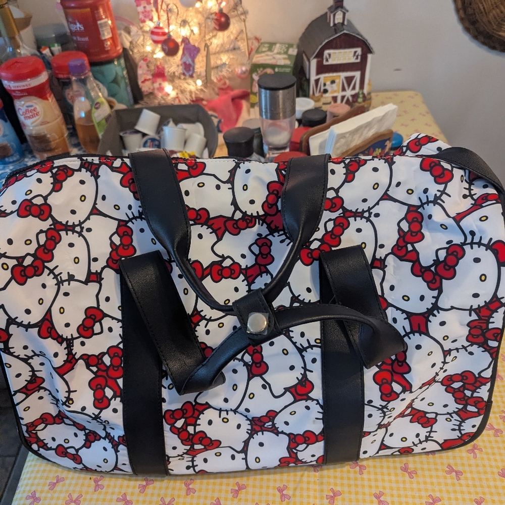 Hello Kitty Rolling Duffel Bag - Red and Black